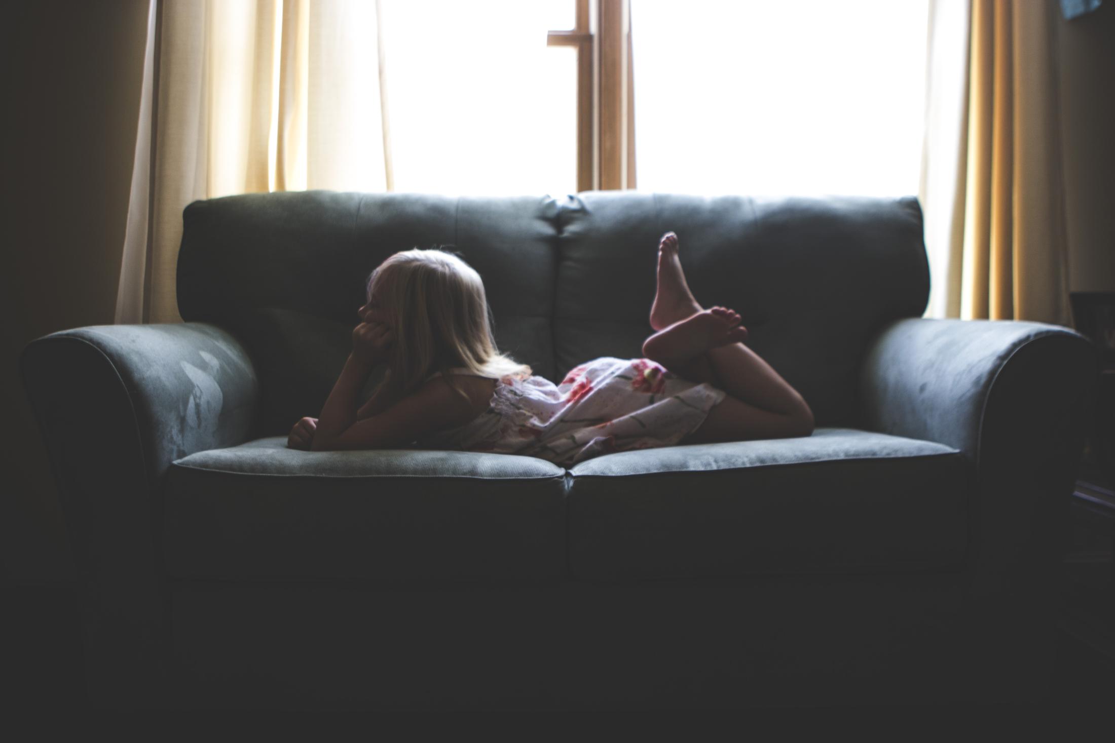 Girl laying on couch