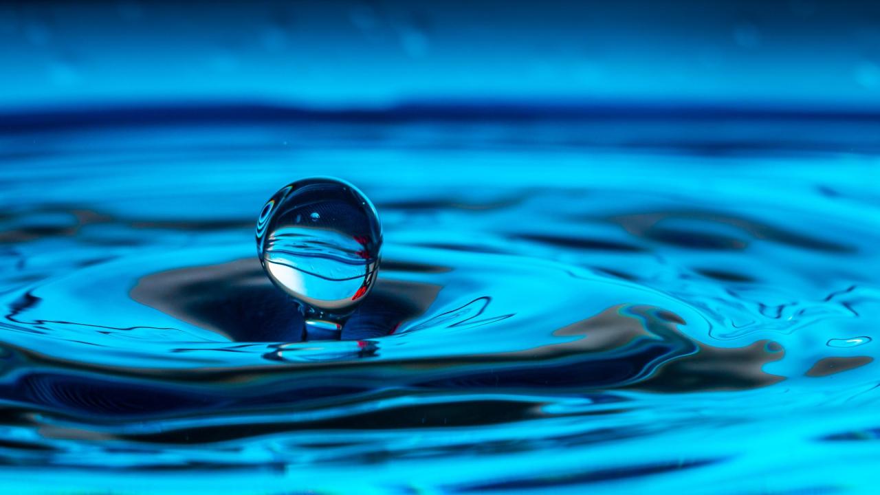 Water Droplet going into Water