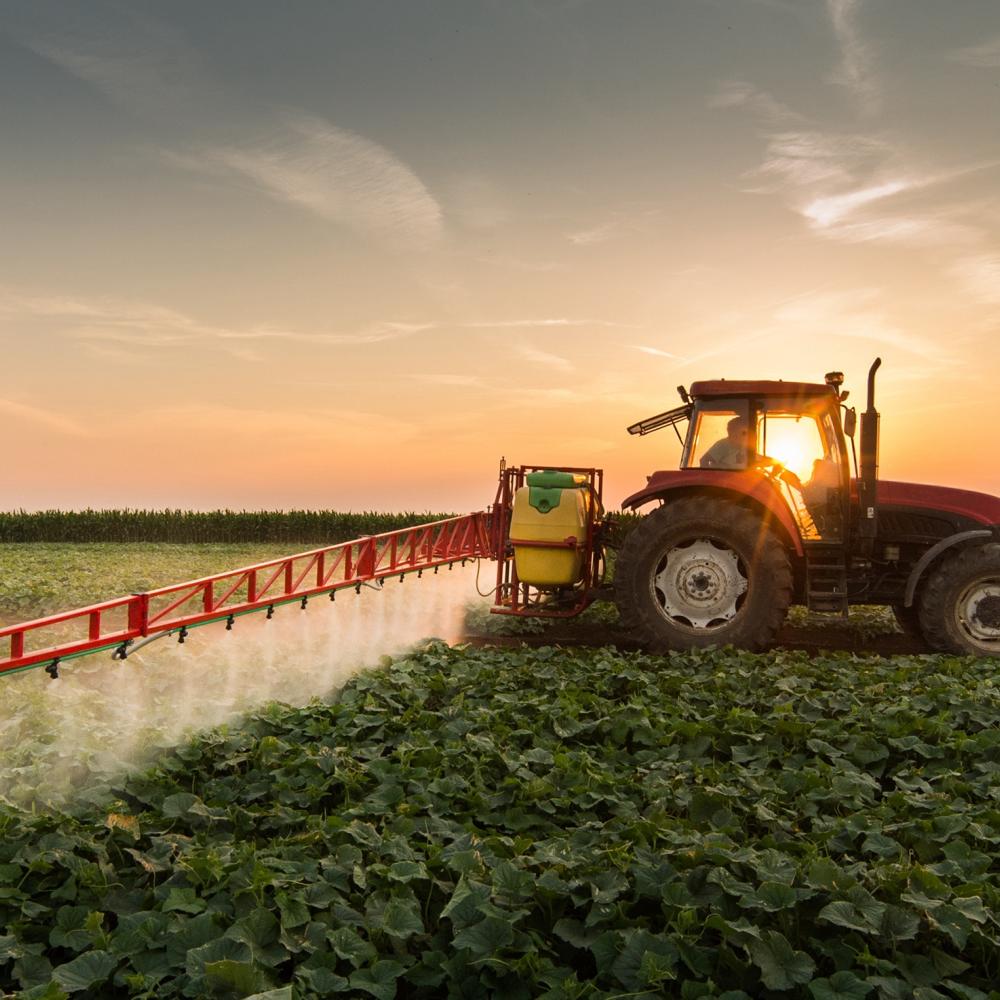 tractor spraying pesticides