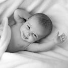 Happy baby in crib