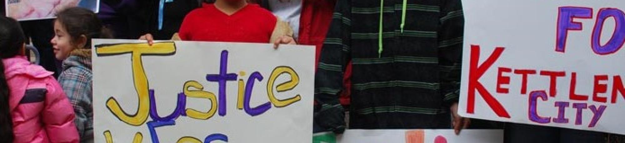 Parents and their children protesting in Kettleman City, California.